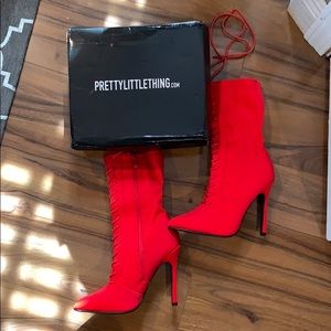 Pretty Little Thing Red lace up sock boots